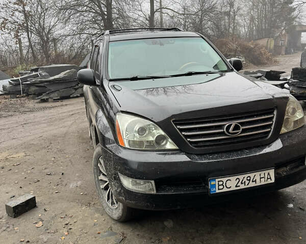 Черный Лексус ГХ, объемом двигателя 4.66 л и пробегом 300 тыс. км за 14000 $, фото 1 на Automoto.ua