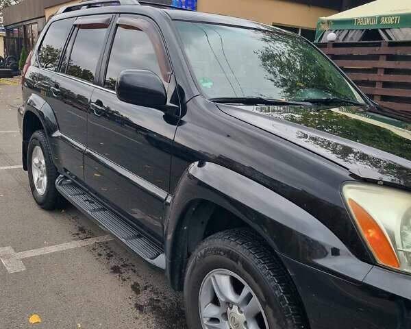 Черный Лексус ГХ, объемом двигателя 4.7 л и пробегом 190 тыс. км за 15000 $, фото 2 на Automoto.ua