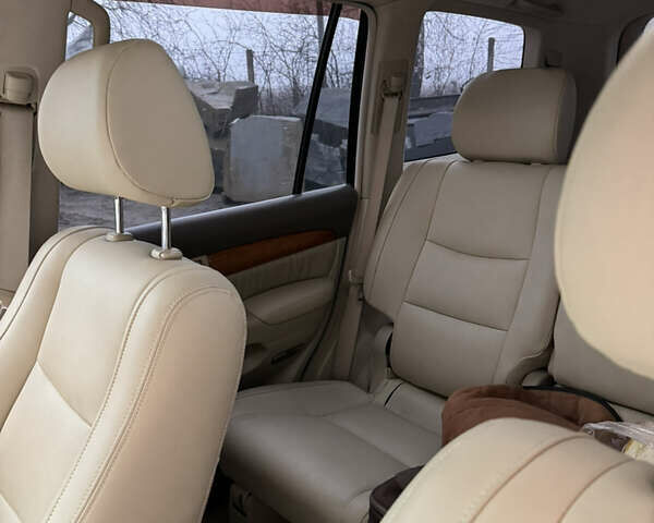 Черный Лексус ГХ, объемом двигателя 4.66 л и пробегом 300 тыс. км за 14000 $, фото 3 на Automoto.ua