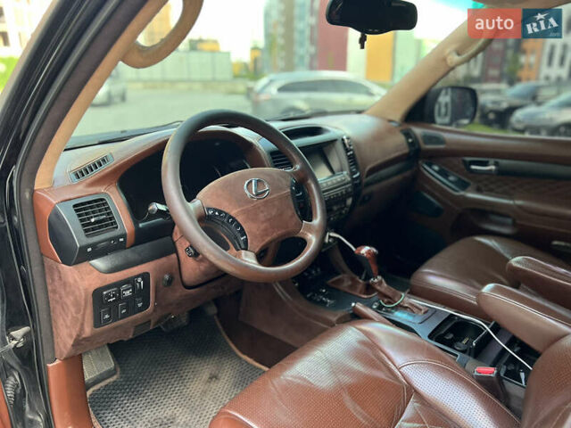 Черный Лексус ГХ, объемом двигателя 4.7 л и пробегом 269 тыс. км за 9400 $, фото 23 на Automoto.ua