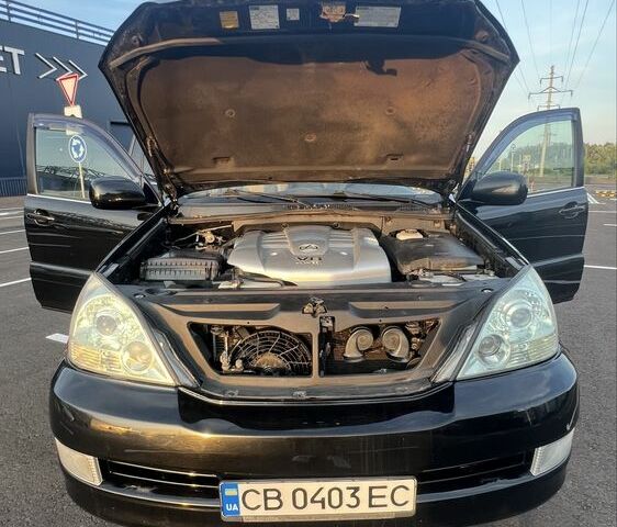 Черный Лексус ГХ, объемом двигателя 4.7 л и пробегом 290 тыс. км за 12700 $, фото 17 на Automoto.ua