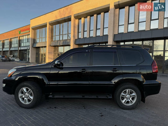 Черный Лексус ГХ, объемом двигателя 4.66 л и пробегом 328 тыс. км за 13650 $, фото 5 на Automoto.ua