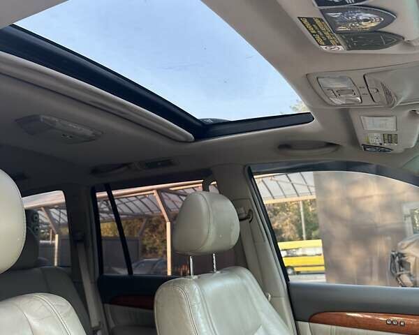 Черный Лексус ГХ, объемом двигателя 4.7 л и пробегом 229 тыс. км за 18500 $, фото 49 на Automoto.ua