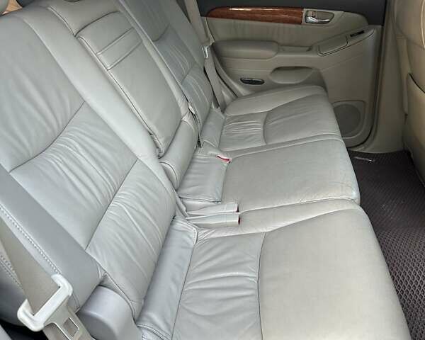 Черный Лексус ГХ, объемом двигателя 4.7 л и пробегом 229 тыс. км за 18500 $, фото 17 на Automoto.ua