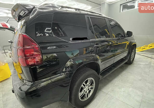 Черный Лексус ГХ, объемом двигателя 4.66 л и пробегом 234 тыс. км за 14000 $, фото 3 на Automoto.ua