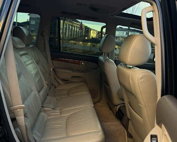 Черный Лексус ГХ, объемом двигателя 4.66 л и пробегом 328 тыс. км за 13650 $, фото 13 на Automoto.ua