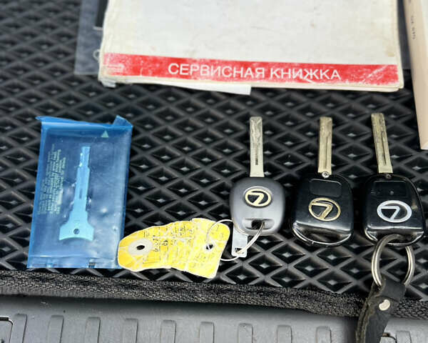 Чорний Лексус ГХ, об'ємом двигуна 4.66 л та пробігом 348 тис. км за 18400 $, фото 33 на Automoto.ua