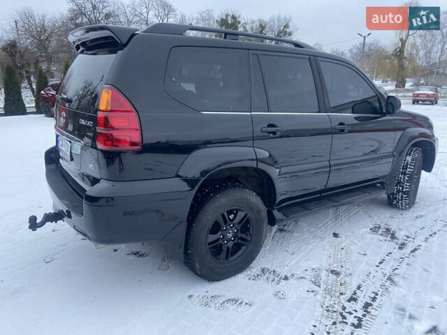 Черный Лексус ГХ, объемом двигателя 4.7 л и пробегом 315 тыс. км за 14444 $, фото 5 на Automoto.ua