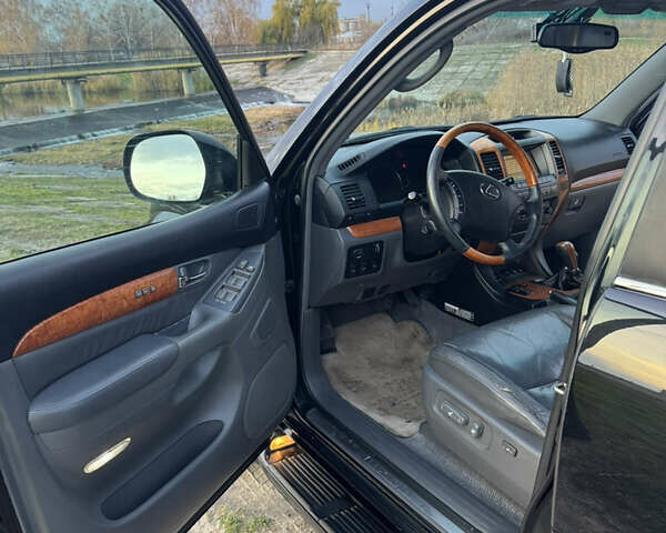 Чорний Лексус ГХ, об'ємом двигуна 4.66 л та пробігом 260 тис. км за 14700 $, фото 12 на Automoto.ua