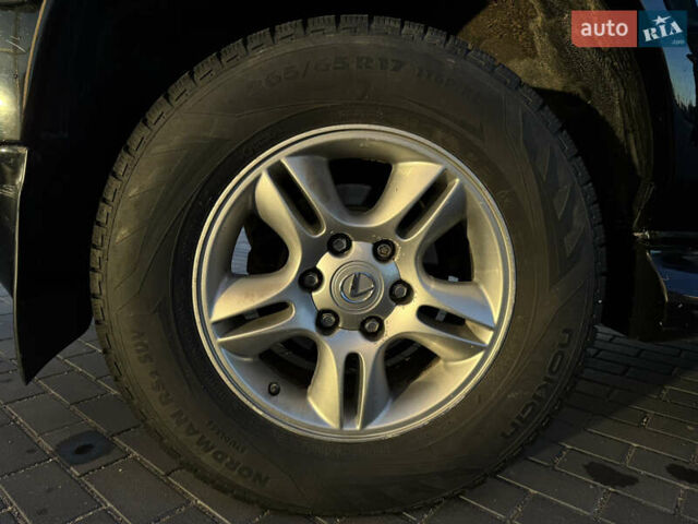 Черный Лексус ГХ, объемом двигателя 4.66 л и пробегом 328 тыс. км за 13650 $, фото 17 на Automoto.ua