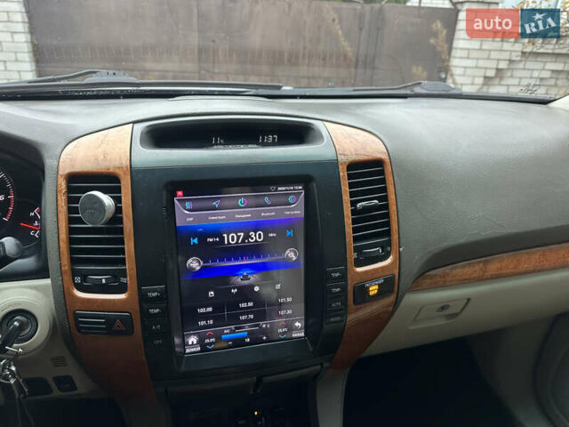 Черный Лексус ГХ, объемом двигателя 4.66 л и пробегом 299 тыс. км за 17500 $, фото 24 на Automoto.ua