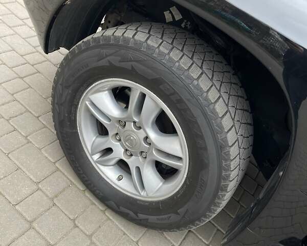 Черный Лексус ГХ, объемом двигателя 4.66 л и пробегом 210 тыс. км за 15800 $, фото 19 на Automoto.ua