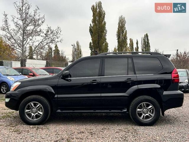 Черный Лексус ГХ, объемом двигателя 4.66 л и пробегом 367 тыс. км за 19000 $, фото 4 на Automoto.ua