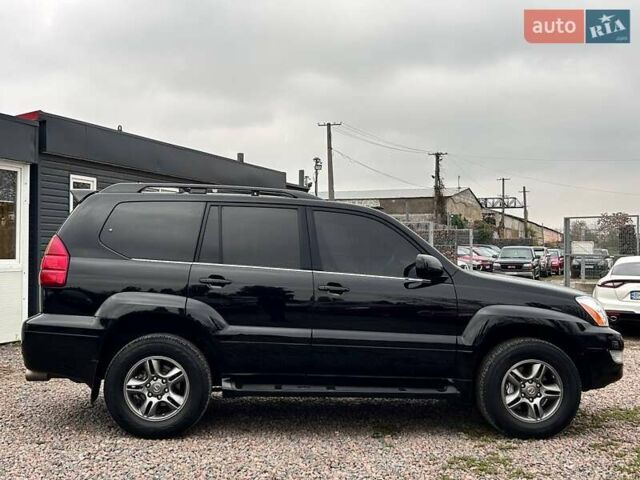 Черный Лексус ГХ, объемом двигателя 4.66 л и пробегом 367 тыс. км за 19000 $, фото 3 на Automoto.ua