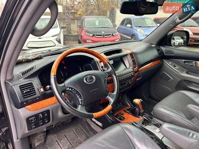 Черный Лексус ГХ, объемом двигателя 4.66 л и пробегом 367 тыс. км за 19000 $, фото 11 на Automoto.ua