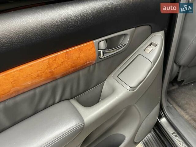 Черный Лексус ГХ, объемом двигателя 4.66 л и пробегом 210 тыс. км за 15800 $, фото 14 на Automoto.ua