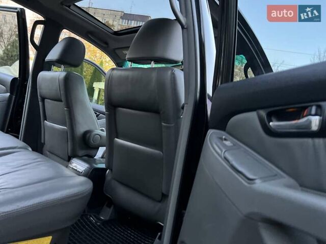 Лексус ГХ 2007 у Хмельницькому на Automoto.ua Чорний Лексус ГХ, об'ємом двигуна 4.7 л та пробігом 230 тис. км за 17900 $, фото 76 на Automoto.ua