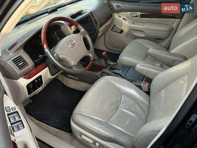 Черный Лексус ГХ, объемом двигателя 4.66 л и пробегом 271 тыс. км за 18000 $, фото 6 на Automoto.ua