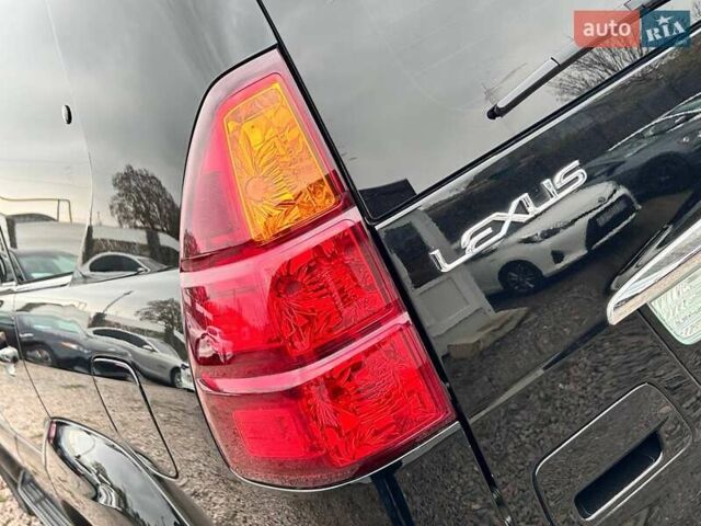 Черный Лексус ГХ, объемом двигателя 4.66 л и пробегом 367 тыс. км за 19000 $, фото 6 на Automoto.ua