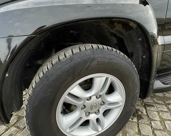 Черный Лексус ГХ, объемом двигателя 4.66 л и пробегом 235 тыс. км за 14600 $, фото 1 на Automoto.ua