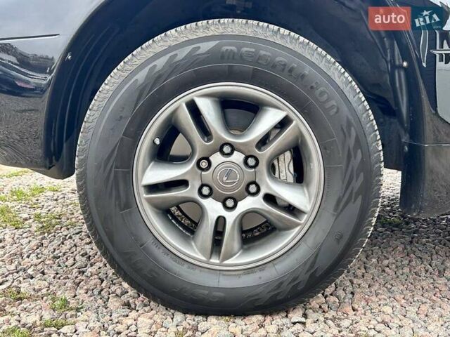Черный Лексус ГХ, объемом двигателя 4.66 л и пробегом 367 тыс. км за 19000 $, фото 37 на Automoto.ua