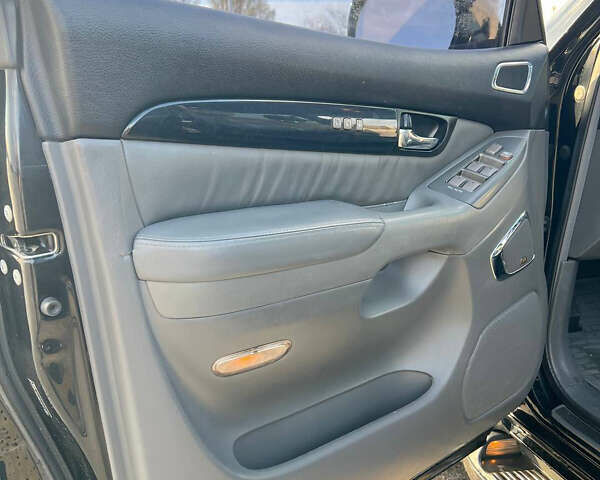 Черный Лексус ГХ, объемом двигателя 4.66 л и пробегом 190 тыс. км за 20500 $, фото 7 на Automoto.ua