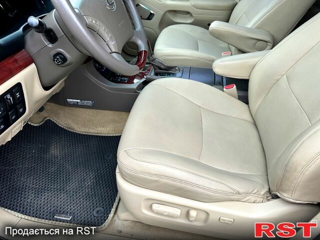 Черный Лексус ГХ, объемом двигателя 47 л и пробегом 241 тыс. км за 16900 $, фото 9 на Automoto.ua
