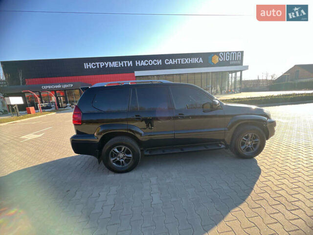 Черный Лексус ГХ, объемом двигателя 4.7 л и пробегом 260 тыс. км за 18500 $, фото 3 на Automoto.ua