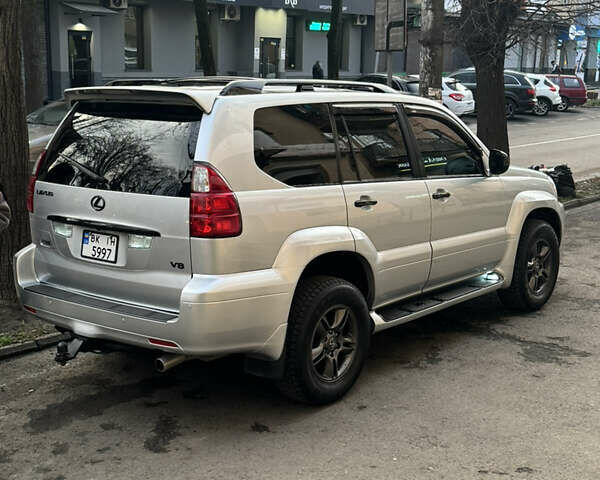 Серый Лексус ГХ, объемом двигателя 4.66 л и пробегом 300 тыс. км за 15500 $, фото 2 на Automoto.ua