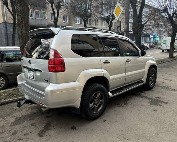 Серый Лексус ГХ, объемом двигателя 4.66 л и пробегом 300 тыс. км за 15500 $, фото 6 на Automoto.ua