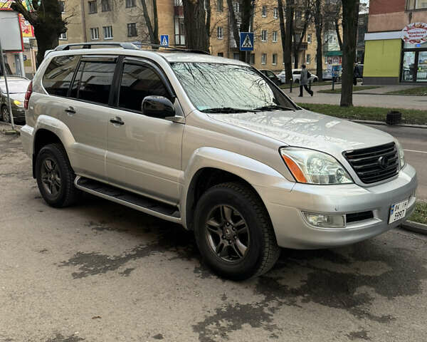 Серый Лексус ГХ, объемом двигателя 4.66 л и пробегом 300 тыс. км за 15500 $, фото 1 на Automoto.ua