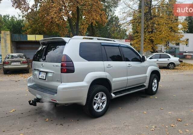 Серый Лексус ГХ, объемом двигателя 4.66 л и пробегом 285 тыс. км за 14600 $, фото 4 на Automoto.ua