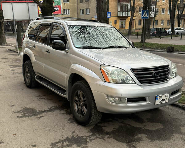 Серый Лексус ГХ, объемом двигателя 4.66 л и пробегом 300 тыс. км за 15500 $, фото 4 на Automoto.ua