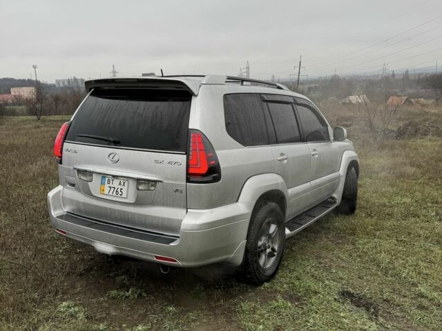 Серый Лексус ГХ, объемом двигателя 4.7 л и пробегом 281 тыс. км за 15000 $, фото 3 на Automoto.ua