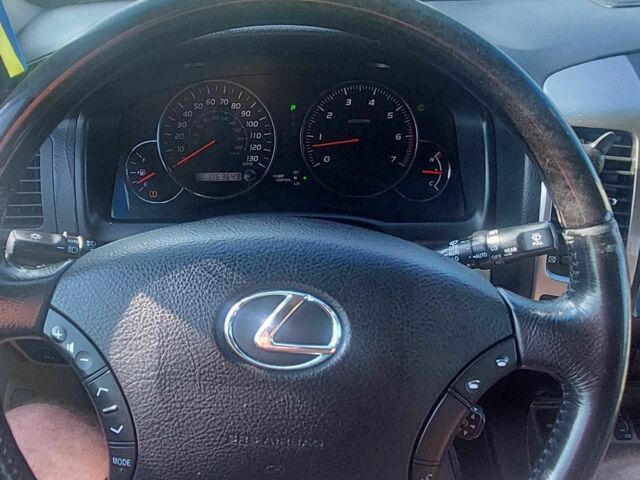 Синий Лексус ГХ, объемом двигателя 4.7 л и пробегом 165 тыс. км за 15500 $, фото 1 на Automoto.ua