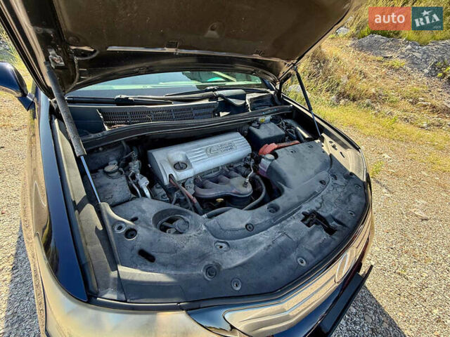 Синій Лексус ХС, об'ємом двигуна 2.36 л та пробігом 155 тис. км за 11000 $, фото 10 на Automoto.ua