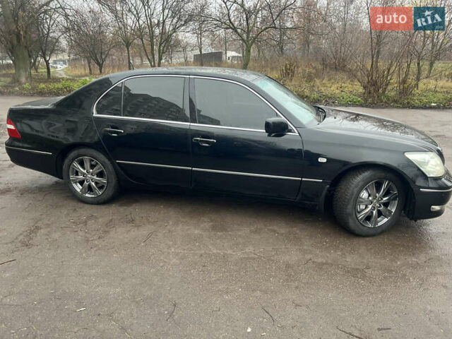 Черный Лексус ЛС, объемом двигателя 4.29 л и пробегом 384 тыс. км за 8600 $, фото 1 на Automoto.ua