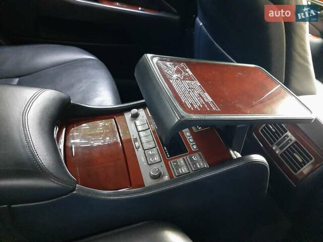 Черный Лексус ЛС, объемом двигателя 4.97 л и пробегом 229 тыс. км за 10800 $, фото 1 на Automoto.ua