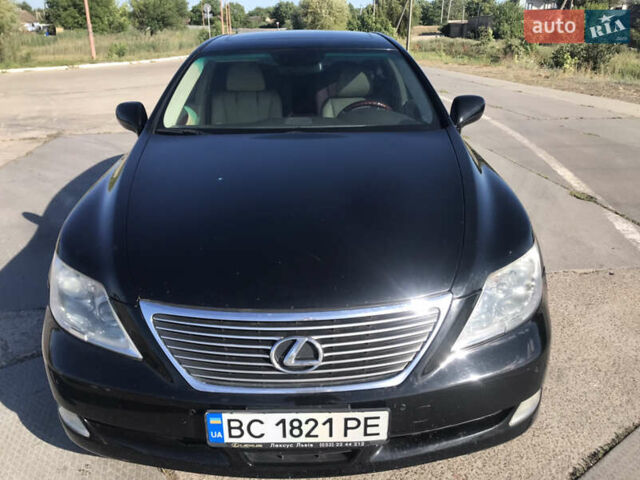 Чорний Лексус ЛС, об'ємом двигуна 4.61 л та пробігом 176 тис. км за 12900 $, фото 1 на Automoto.ua