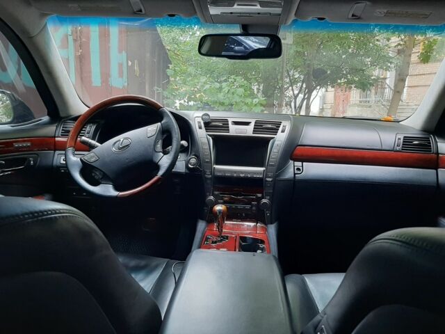 Черный Лексус ЛС, объемом двигателя 5 л и пробегом 229 тыс. км за 10500 $, фото 1 на Automoto.ua