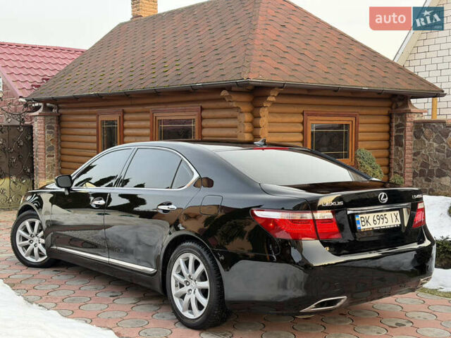 Черный Лексус ЛС, объемом двигателя 4.6 л и пробегом 236 тыс. км за 14999 $, фото 1 на Automoto.ua