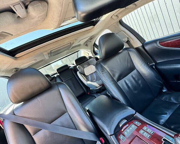 Серый Лексус ЛС, объемом двигателя 4.61 л и пробегом 246 тыс. км за 9500 $, фото 5 на Automoto.ua