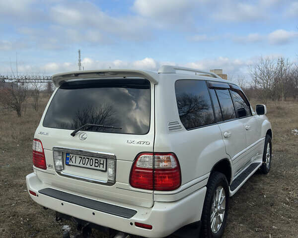 Белый Лексус ЛХ, объемом двигателя 4.7 л и пробегом 263 тыс. км за 15800 $, фото 12 на Automoto.ua