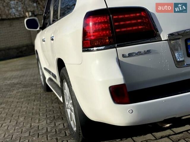 Білий Лексус ЛХ, об'ємом двигуна 5.66 л та пробігом 318 тис. км за 23500 $, фото 9 на Automoto.ua