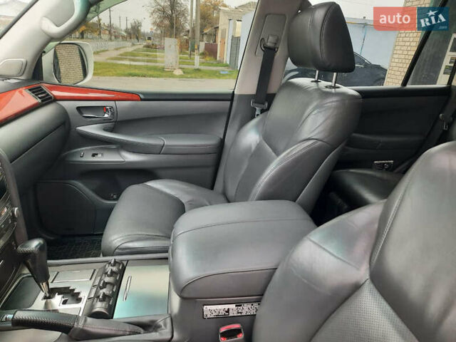 Белый Лексус ЛХ, объемом двигателя 5.66 л и пробегом 348 тыс. км за 16000 $, фото 12 на Automoto.ua