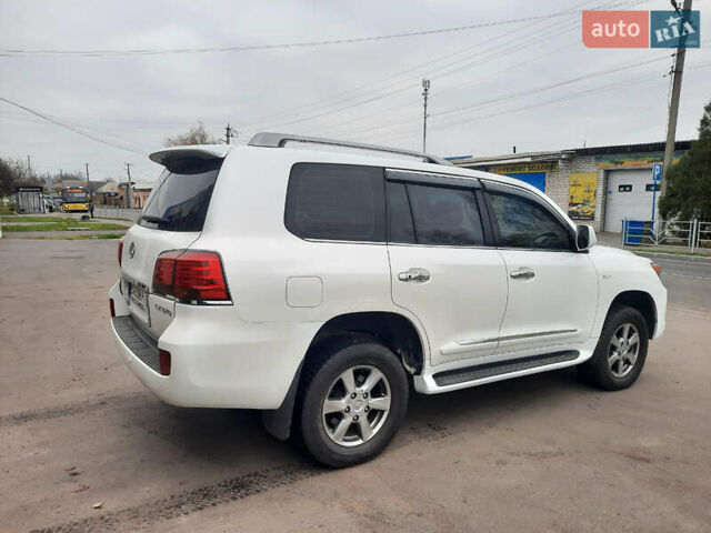 Белый Лексус ЛХ, объемом двигателя 5.66 л и пробегом 348 тыс. км за 16000 $, фото 5 на Automoto.ua