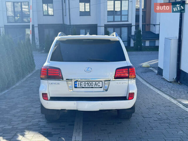 Білий Лексус ЛХ, об'ємом двигуна 5.66 л та пробігом 195 тис. км за 26500 $, фото 4 на Automoto.ua