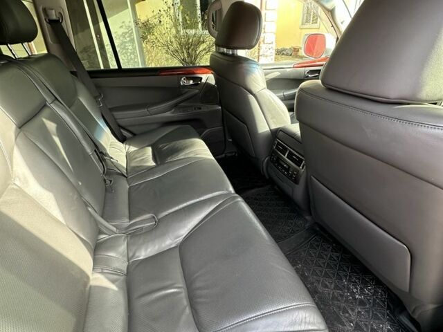 Білий Лексус ЛХ, об'ємом двигуна 5.7 л та пробігом 212 тис. км за 25000 $, фото 4 на Automoto.ua