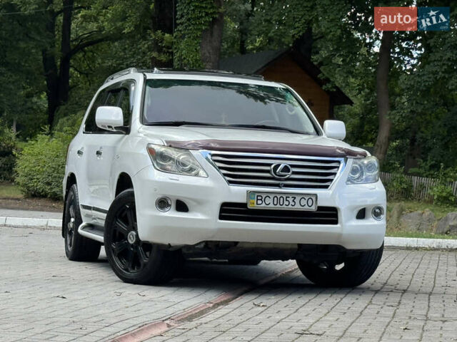 Білий Лексус ЛХ, об'ємом двигуна 5.66 л та пробігом 202 тис. км за 25500 $, фото 1 на Automoto.ua
