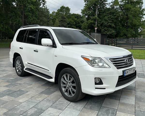 Білий Лексус ЛХ, об'ємом двигуна 5.66 л та пробігом 410 тис. км за 26500 $, фото 1 на Automoto.ua